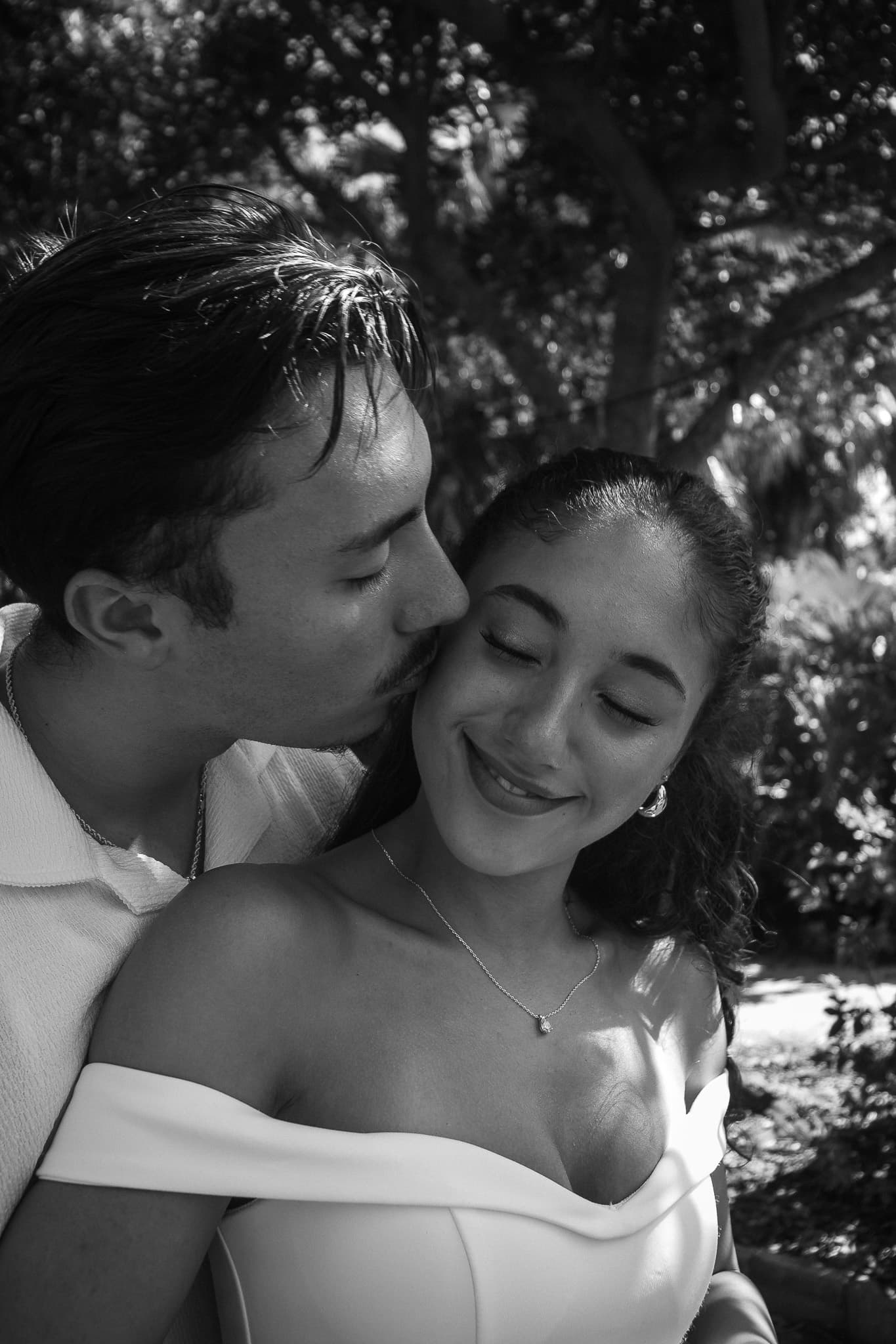Black and white portrait, a kiss on the cheek