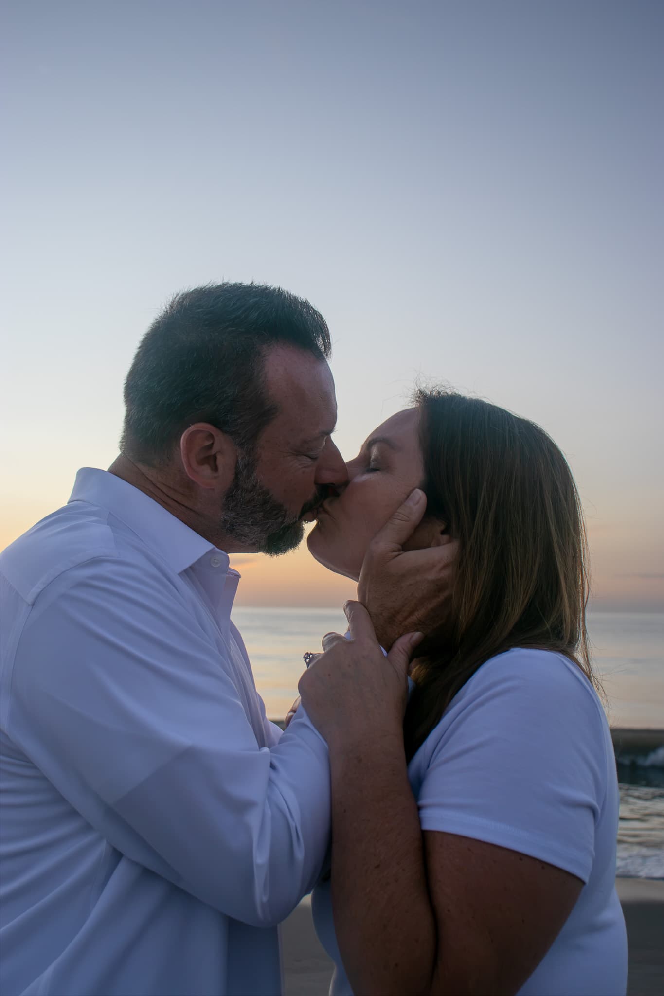 Close couples portrait at sunrise on the Space Coast