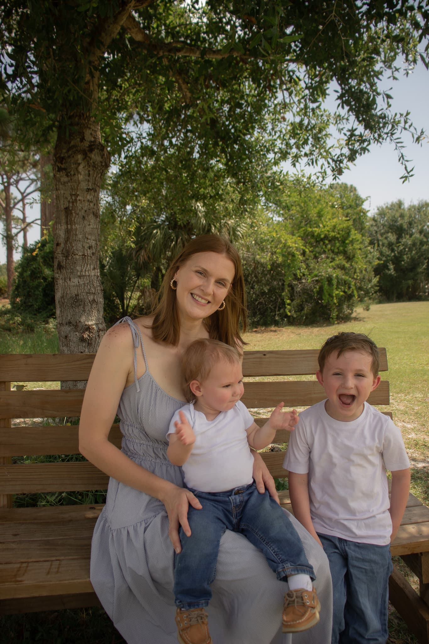 Mother with her two children during a family photography session in Melbourne Florida